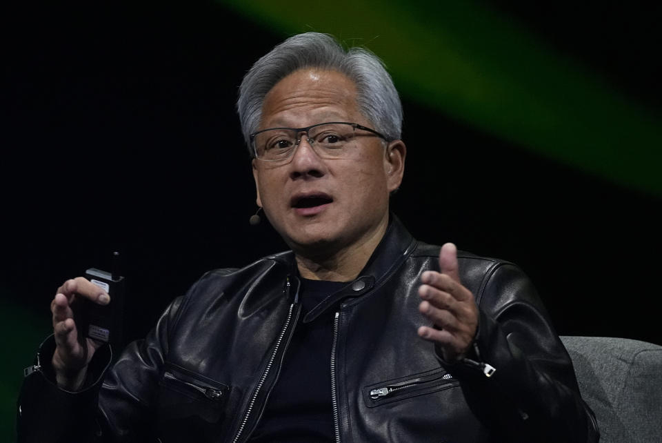 Jensen Huang, chief executive officer of Nvidia, makes a point as keynote speaker at SIGGRAPH 2024, the premier conference on computer graphics and interactive techniques, in the Colorado Convention Center Monday, July 29, 2024, in Denver. (AP Photo/David Zalubowski)