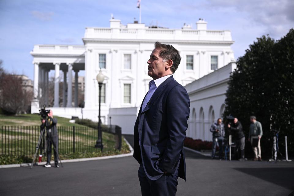 Mark Cuban standing by the White House.