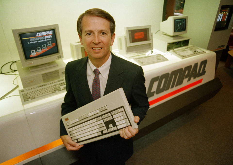 Compaq Computers Corp. President Rod Canion poses with some of the products that put the company on the fast track, in Houston, Texas, July 27, 1988. Six years after the first product was sketched on a napkin, Compaq continues to take the computer industry by storm. (AP Photo/Gayland Wampler)