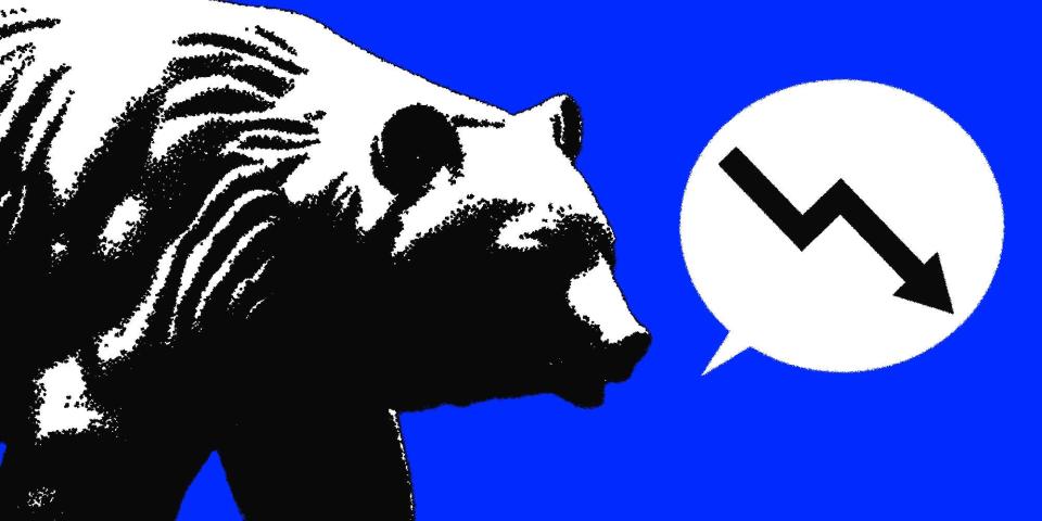 A bear with a speech bubble showing a downward stock arrow