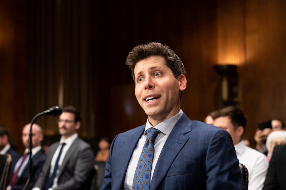 WASHINGTON - MAY 16: Sam Altman, CEO of OpenAI, reacts to the cameras as he takes his seat before the start of the Senate Judiciary Subcommittee on Privacy, Technology, and the Law Subcommittee hearing on 