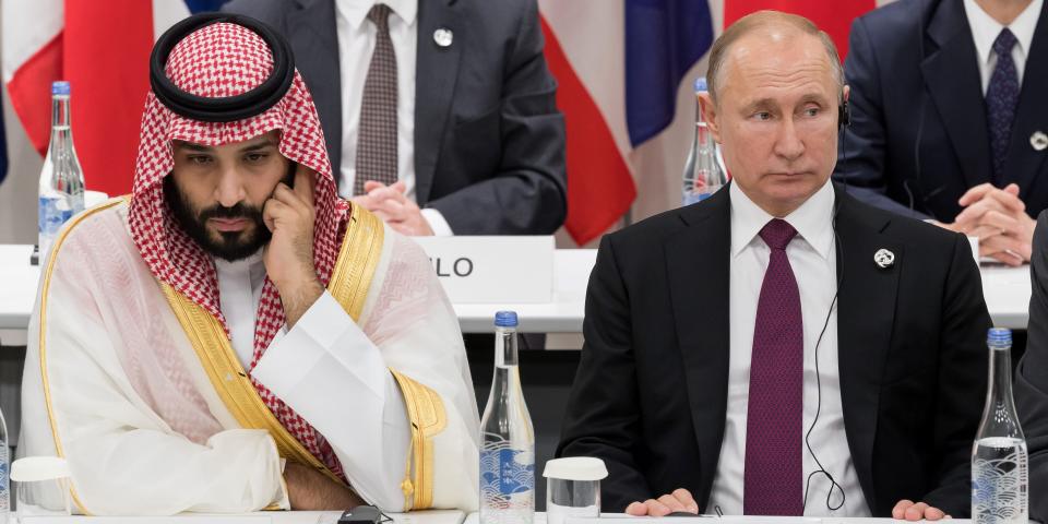 Saudi Arabia's crown prince sitting left of Russian president Vladimir Putin.